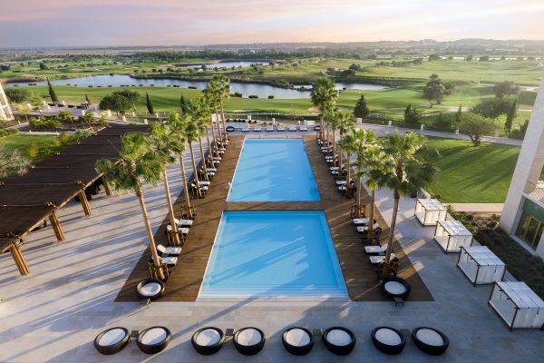 Anantara Vilamoura – main pool with golf course backdrop